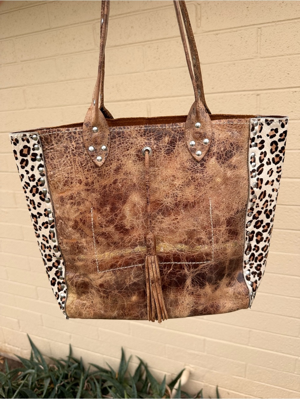Distressed Brown Leather Tote with Leopard Accent and Tassel